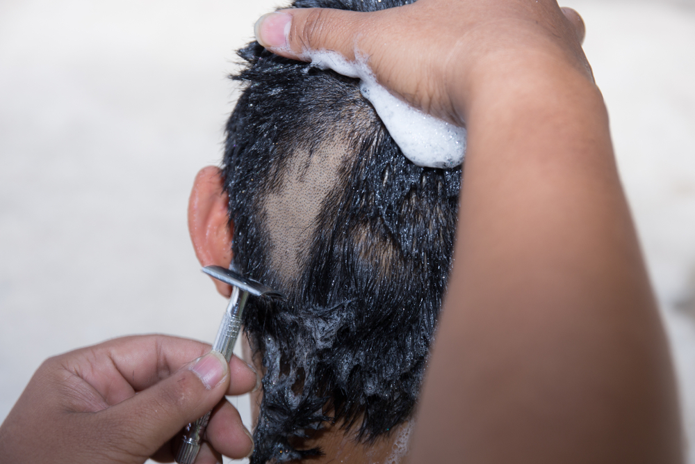 Mother Shaves Daughter's Head After Bullying Incident Sparks Heated Debate
